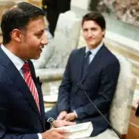 Arif Virani is sworn in as Canada’s Minister of Justice and Lawyer Normal of Canada, as Key Minister Justin Trudeau sits, in the course of a Cupboard shuffle at Rideau Corridor, in Ottawa, Ontario, on Wednesday. (REUTERS)