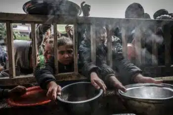 | Displaced Palestinian children wait to receive food in Rafah Gaza Strip 19 February 2024 Mohammed AbedAFP | MR Online