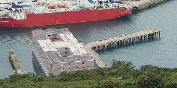 MR Online | The Bibby Stockholm docked in Portland Dorset in August 2023 CREDIT ANDREW BONE | MR Online