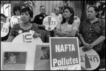 | Workers and organizers of the garment workers | MR Online' union UNITE demonstrate outside a sewing factory in Vernon, California. The factory closed and moved to Mexico in the wake of NAFTA's passage. (David Bacon)