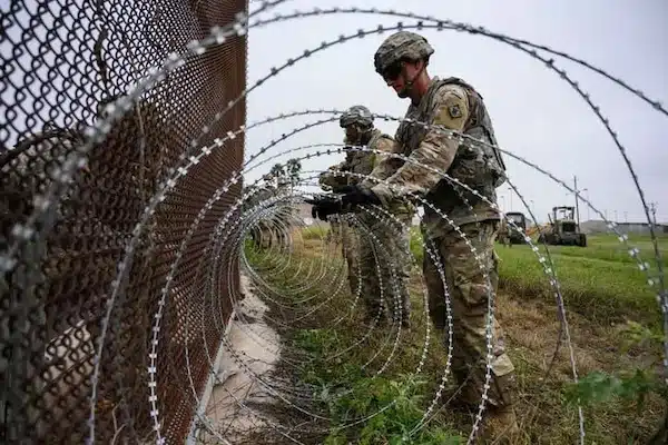 | Soldiers put concertina wire on a border fence near the Brownsville and Matamoros Express International Bridge in Brownsville Texas | MR Online