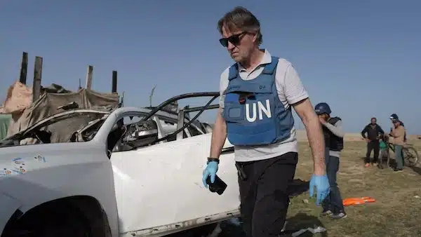 | UN staff members inspect the carcass of a car used by US based aid group World Central Kitchen that was hit by an Israeli strike in Deir al Balah central Gaza on 2 April 2024 AFP | MR Online