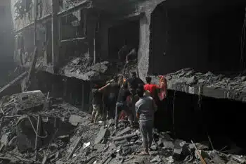 | Palestinians try to rescue survivors and pull bodies from the rubble after Israeli airstrikes hit buildings near Al Aqsa Martyrs Hospital in Deir al Balah central Gaza October 22 2023 Mohammed ZaanounActivestills | MR Online