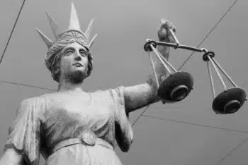 | Themis scales of justice statue outside the Brisbane Supreme Court Australia Photo from Flickr | MR Online