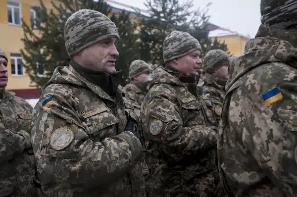 | Ukrainian soldiers of the 1st Battalion 28th Mechanized Infantry Brigade sing along as their national anthem is played during the opening ceremonies for their training rotation with the Joint Multinational Training Group Ukraine at the International Peacekeeping and Security Center near Yavoriv Ukraine on Feb 2 Photo by Sgt Anthony Jones 45th Infantry Brigade Combat Team | MR Online