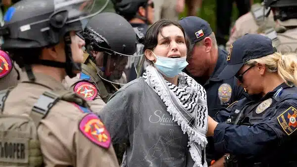 MR Online Part 6 | Texas state troopers and University of Texas Police detain a woman at a pro Palestinian protest at the University of Texas on 24 April 2024 Reuters | MR Online