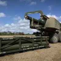| A US Army soldier prepares the crane for loading the Army Tactical Missile System ATACMS on to the High Mobility Artillery Rocket System HIMARS in Queensland Australia July 26 2023 AP PhotoSgt 1st Class Andrew Dickson | MR Online