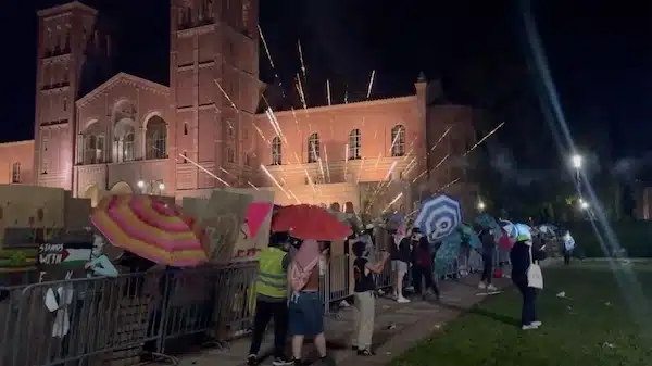 | Zionist counter protesters launch fireworks at UCLA Gaza Solidarity Encampment Screenshot via FilmThePoliceLA | MR Online