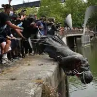 | Protesters throw the statue of merchant and slave trader Edward Colston into Bristol harbour during a Black Lives Matter protest rally 2020 | MR Online
