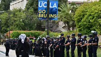 | Police line up outside the University of California Los Angeles UCLA campus after clearing a new pro Palestine student encampment in Los Angeles California on 23 May 2024 Frederic J BrownAFP | MR Online