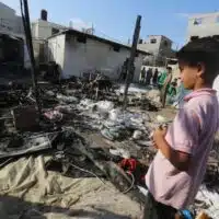 PALESTINIANS INSPECT THE SITE OF ISRAELI STRIKE THAT HIT A TENT AREA IN THE COURTYARD OF AL AQSA MARTYRS HOSPITAL IN DEIR AL BALAH, GAZA STRIP, SUNDAY, AUG. 4, 2024. THE STRIKE KILLED SEVERAL PEOPLE INCLUDING A WOMAN AND INJURED OTHERS, HEALTH OFFICIALS CONFIRMED. (PHOTO BY OMAR ASHTAWY/APAIMAGES_