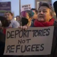 Pro-migrant protesters gather in the Parliament Square during a demonstration against government’s controversial immigration bill, in London United Kingdom on March 13, 2023 [Raşid Necati Aslım – Anadolu Agency]