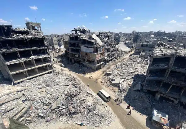 MR Online | PEOPLE MAKE THEIR WAY AMID THE RUBBLE OF BUILDINGS DESTROYED DURING ISRAELI BOMBARDMENT OF THE THE JABALIA REFUGEE ON AUGUST 31 2024 PHOTO HADI DAOUD APA IMAGES | MR Online